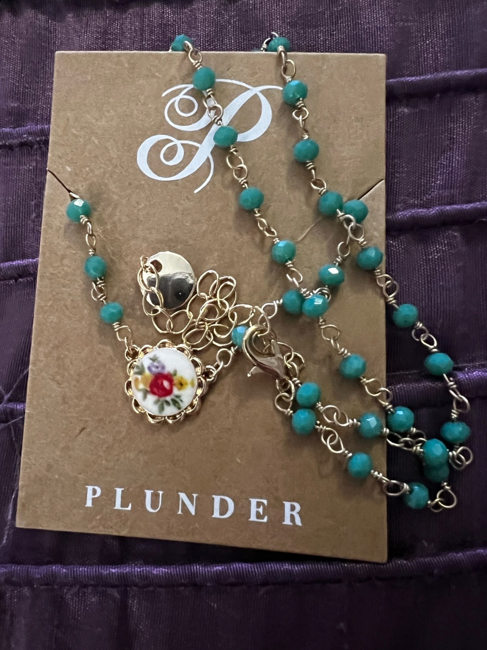 Plunder Turquoise Beaded Necklace with Gold Floral Charm